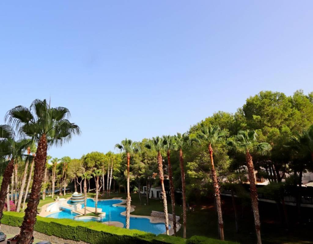 Apartment In Campoamor Overlooking The Swimming Pool Extérieur photo