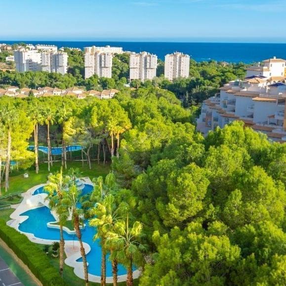 Apartment In Campoamor Overlooking The Swimming Pool Extérieur photo