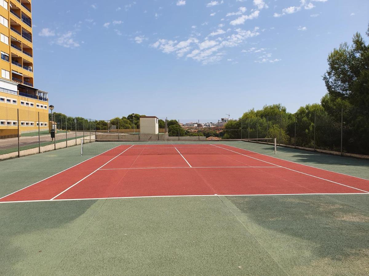 Apartment In Campoamor Overlooking The Swimming Pool Extérieur photo