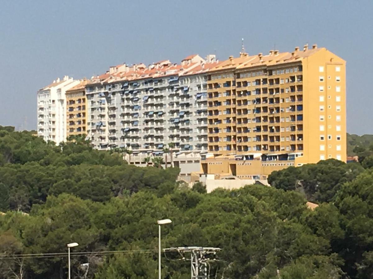 Apartment In Campoamor Overlooking The Swimming Pool Extérieur photo